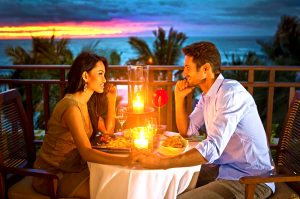 Couple enjoying romantic candlelight dinner