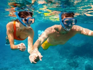 Gallery 12 Couple Diving and Snorkeling at Banana Reef Maldives